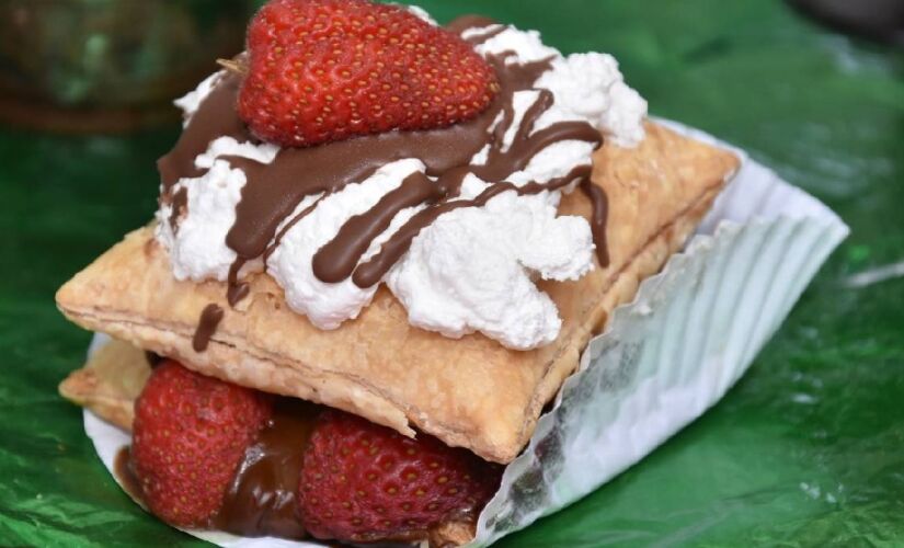 Evento reúne música e gastronomia variada, especialmente com opções que envolvem morango, chocolate e churros