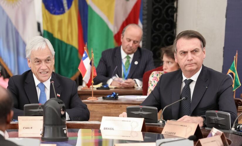 O presidente chileno Sebastián Piñera e o presidente Jair Bolsonaro durante abertura do fórum