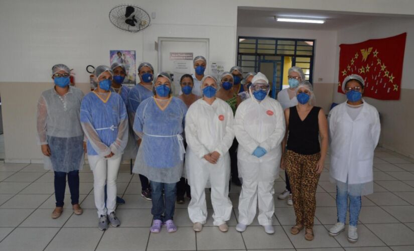 Equipe de profissionais que trabalham na unidade de saúde da Popular, um dos pontos de referência