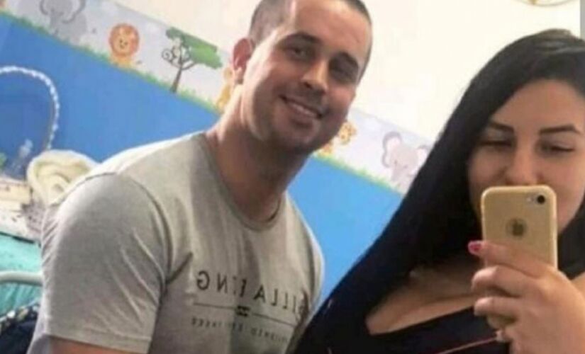 O policial militar Victor Rodrigues Pinto da Silva, ao lado de sua esposa 