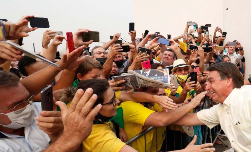 Jair Bolsonaro, sem m&aacute;scara, durante visita ao Mato Grosso em setembro