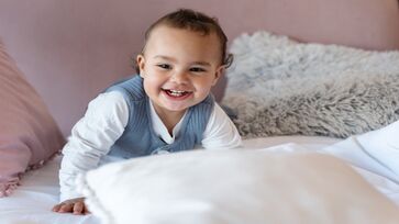 Entenda o porquê um bebê sorri para você 