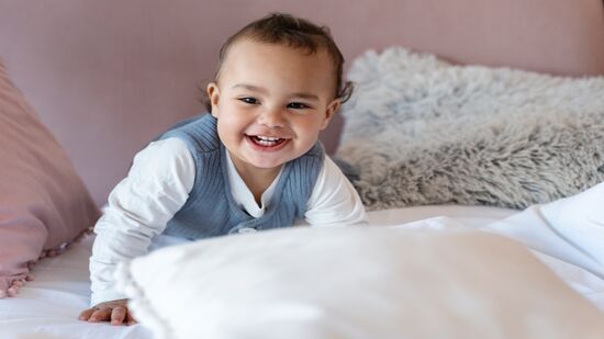 Entenda o porquê um bebê sorri para você 