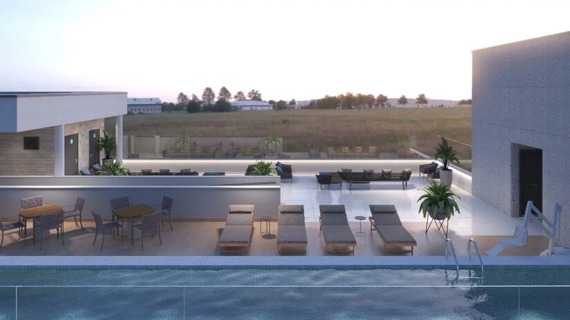 Estrutura inclui recepção, lounge, auditórios moduláveis para até 200 pessoas, academia completa e rooftop com piscina e vista para a Serra do Mar - Divulgação
