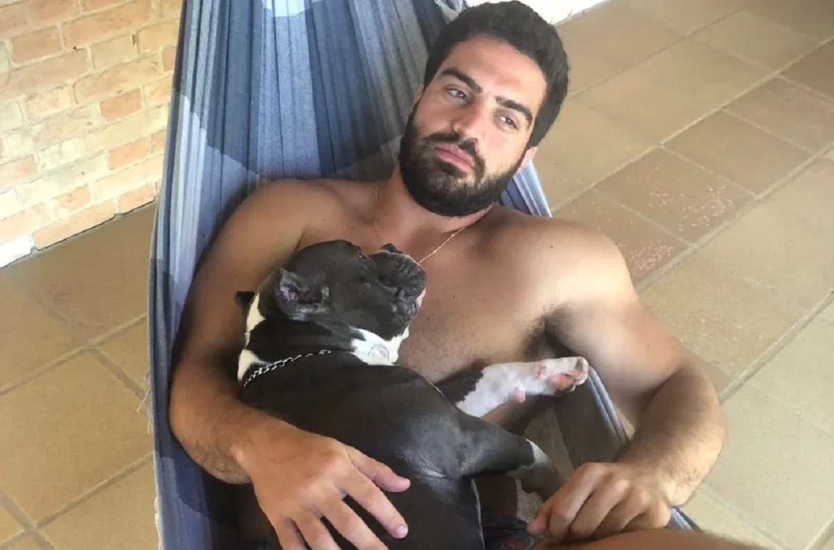 Giuliano Conte, de 29 anos e seu cão Weiser