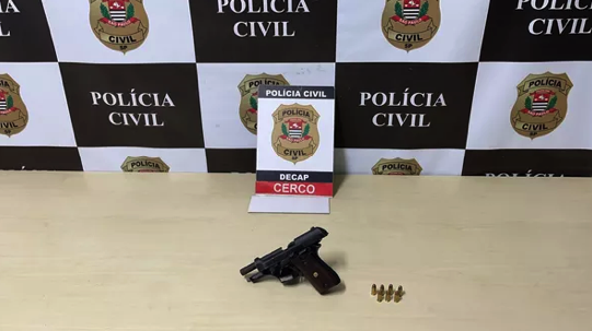 Arma apreendida na ação