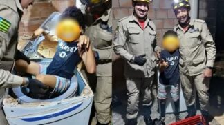 Criança fica presa em máquina de lavar