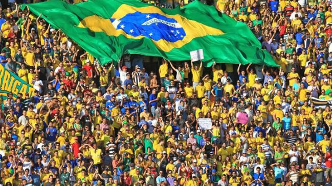 Levantamento mostra que duas das primeiras cidades que receberão jogos da Seleção Brasileira já registram aumento significativo nos preços
