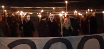 Fãs de Bolsonaro mascarados e liderados por Sara Winter.
