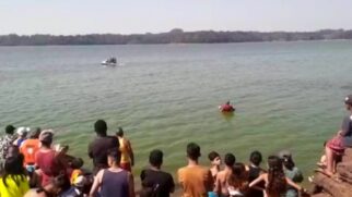 A represa estava cheia de banhistas e pescadores