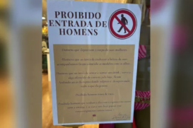 Aviso proibindo entrada de clientes do sexo masculino